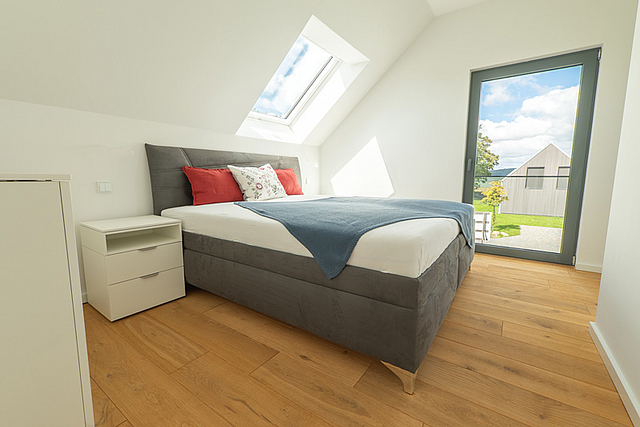 Ferienhaus kaufen Rügen Schlafzimmer Bett