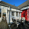 Hausansicht mit Terrasse Wohnung Kauf 26736 Krummhörn / Greetsiel Hausansicht mit Terrasse